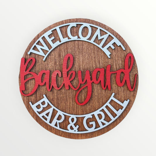 Welcome Backyard Bar & Grill Sign